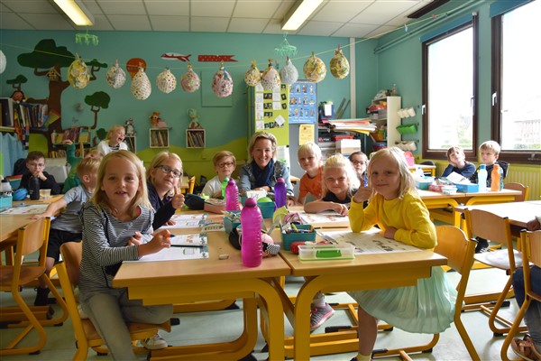 schooluren de glimlach